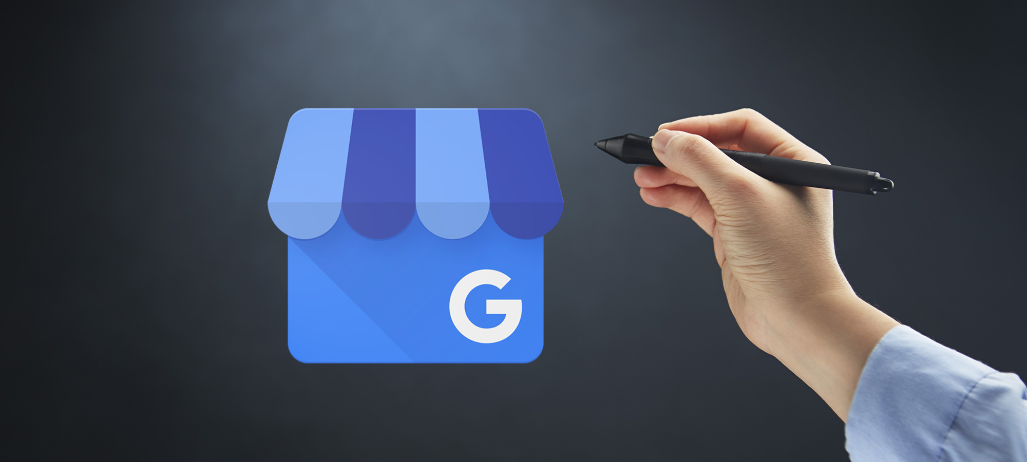 Logo Google my business avec une main qui tient un stylet